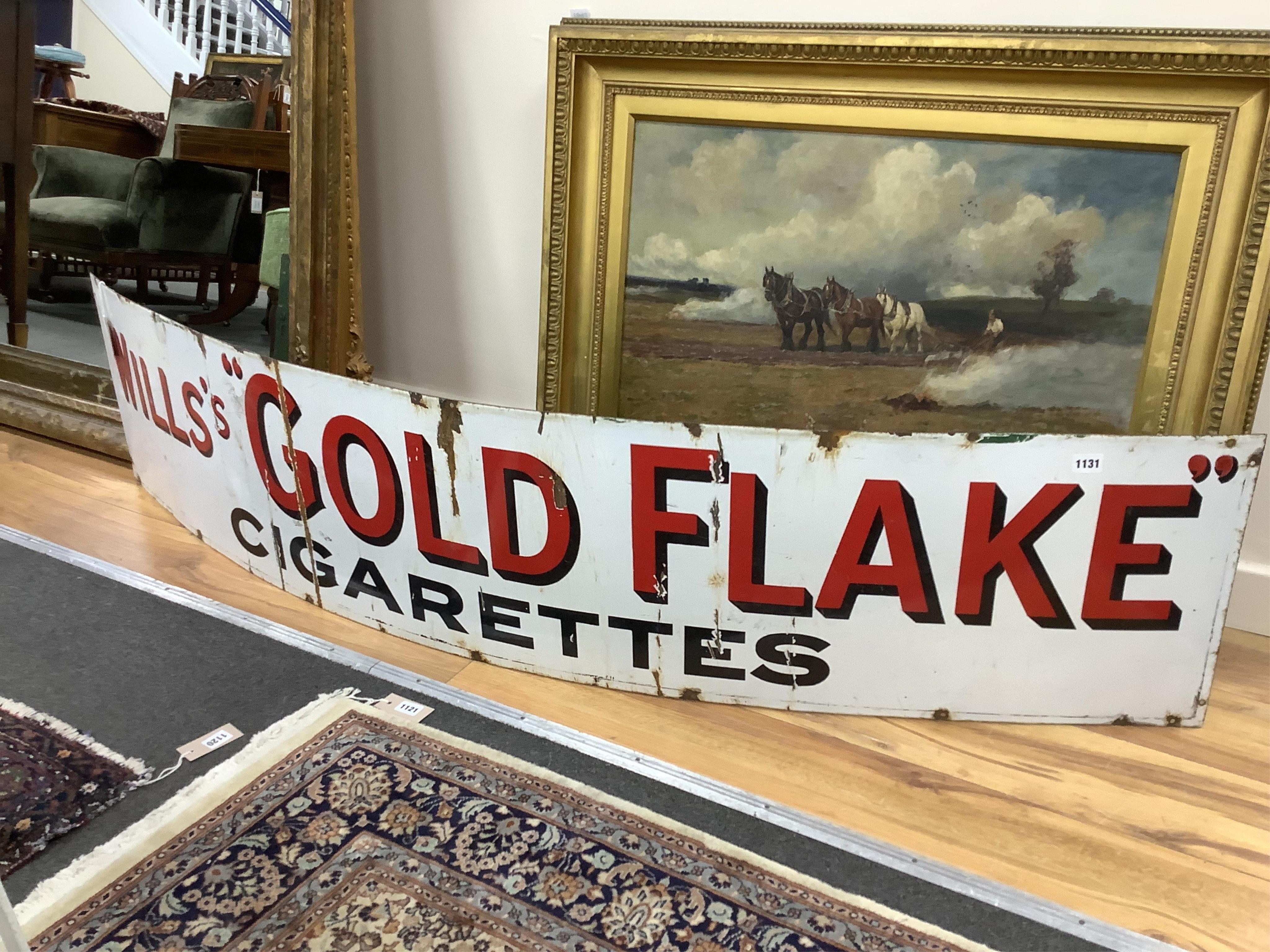 A large enamel sign 'Will's Gold Flake', width 170cm, height 38cm. Condition - fair